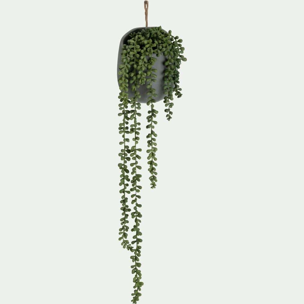 Plante suspendue artificielle dans un pot en ciment - ver