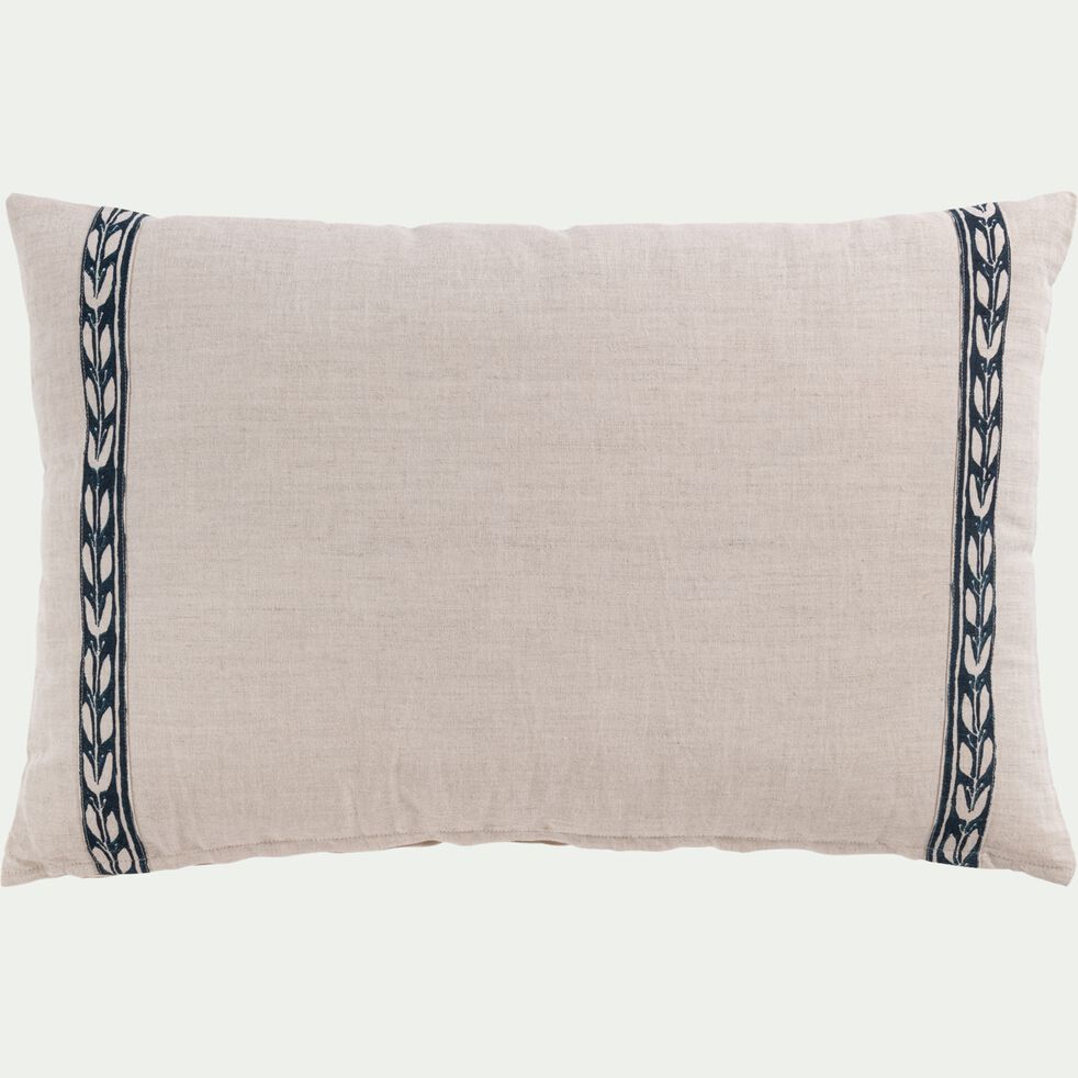 coussin avec liseré motif kissos